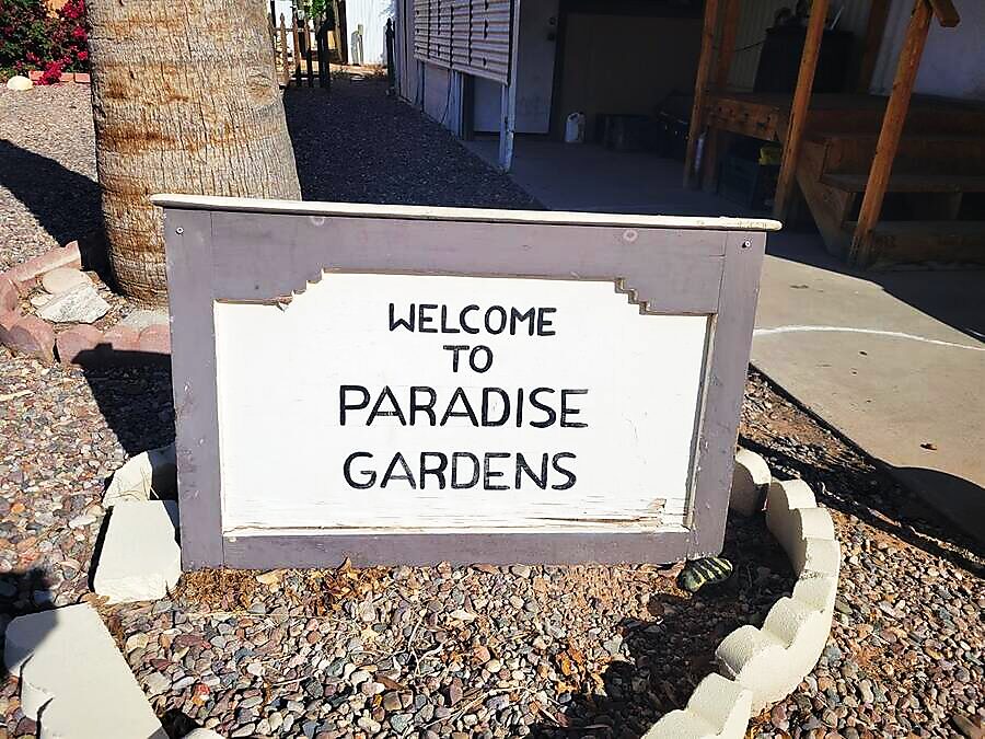 Welcome to Paradise Gardens sign